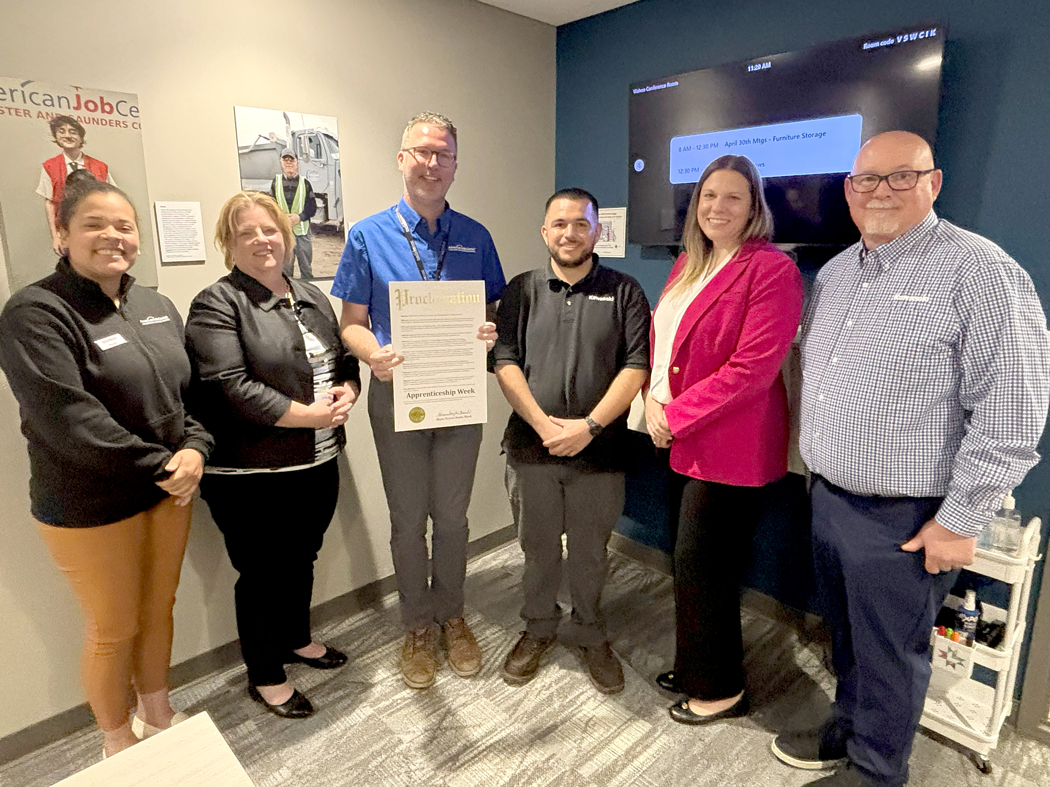 From left: Ronesha Love, Operations Manager, American Job Center of Lancaster and Saunders County; Twilya L&rsquo;Ecuyer, Apprenticeship Program Director, Southeast Community College; Dylan Wren, Workforce Administrator, American Job Center of Lancaster and Saunders County; Aaron Rios, former apprentice and current employee at Kawasaki; Commissioner Thurber; and Jim Townsend, Corporate Manager, Kawasaki